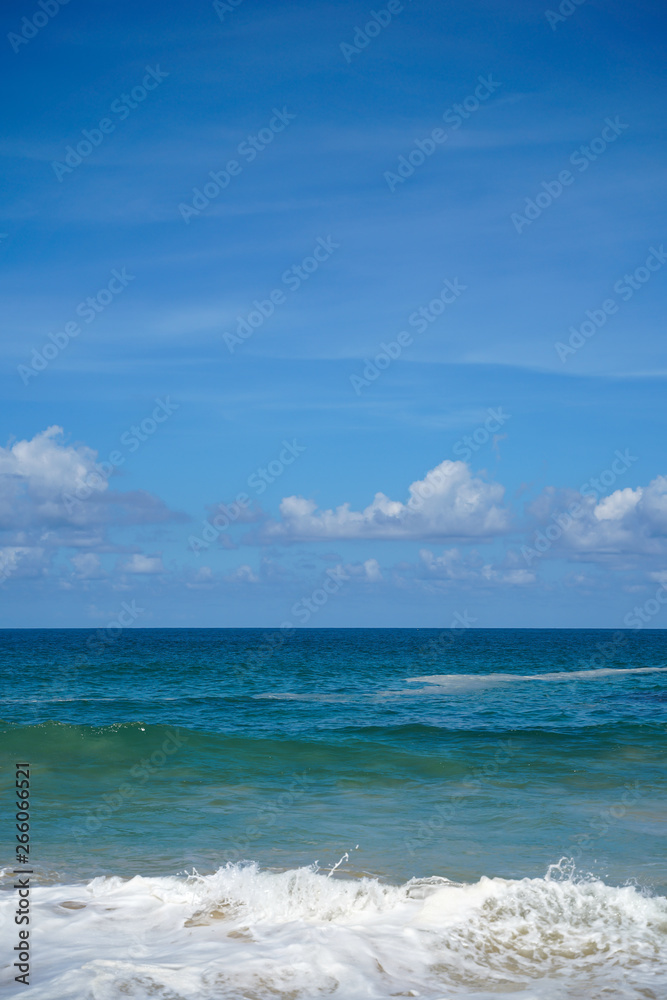Clouds blue sky and calm sea background landscape