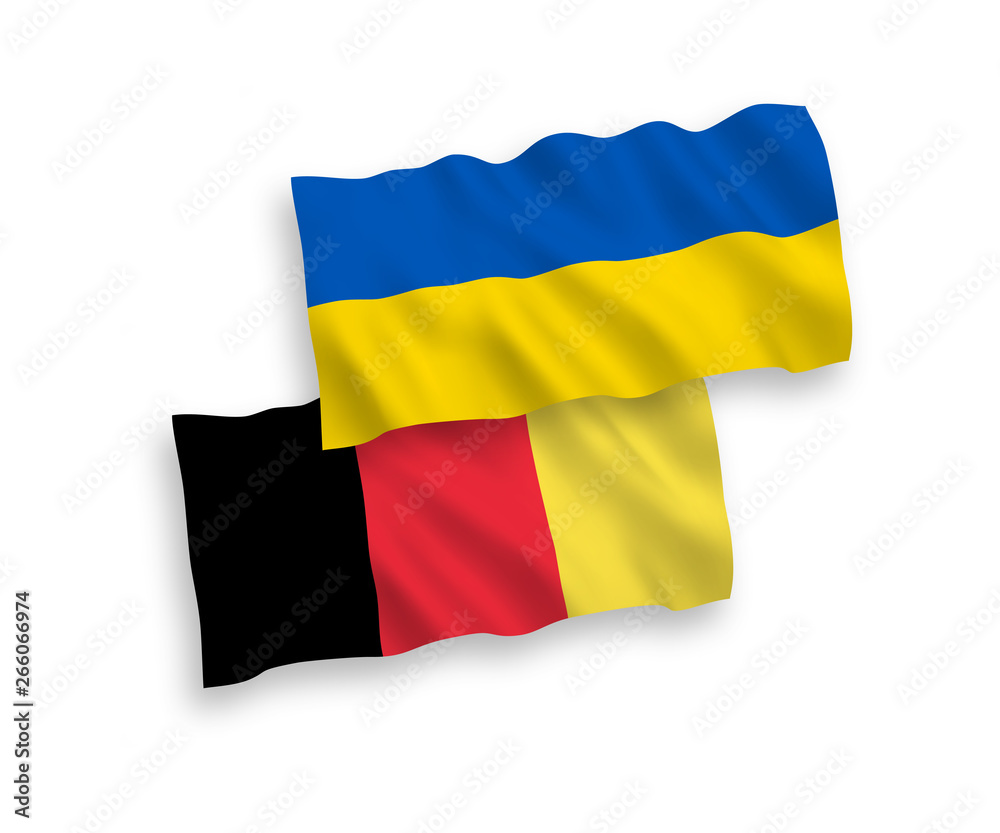 National vector fabric wave flags of Belgium and Ukraine isolated on white background. 1 to 2 proportion. National vector fabric wave flags of Belgium and Ukraine isolated on white background. 1 to 2 proportion.