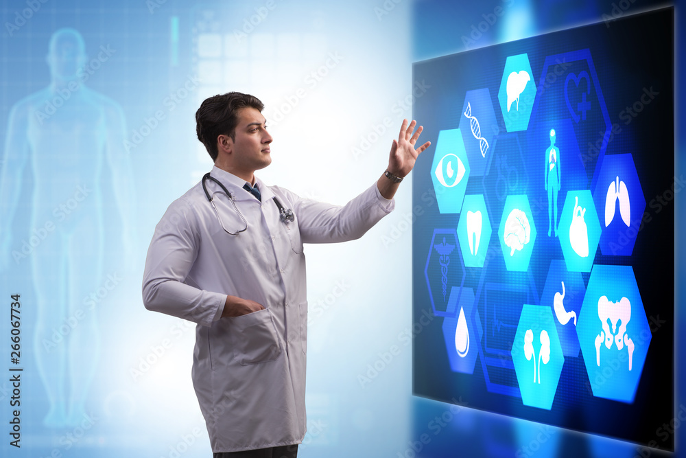 Doctor in telemedicine concept looking at screen Doctor in telemedicine concept looking at screen