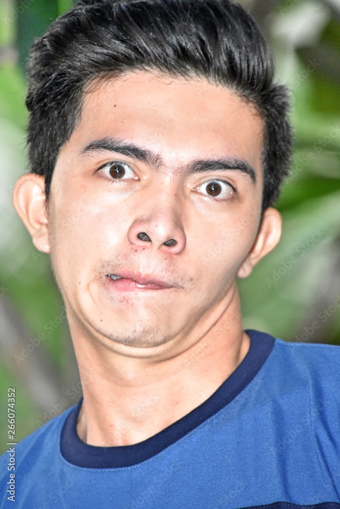 Obraz premium Confused Handsome Asian Person