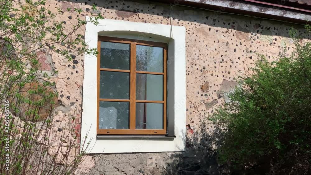 Slow motion of an old house window Slow motion of an old house window