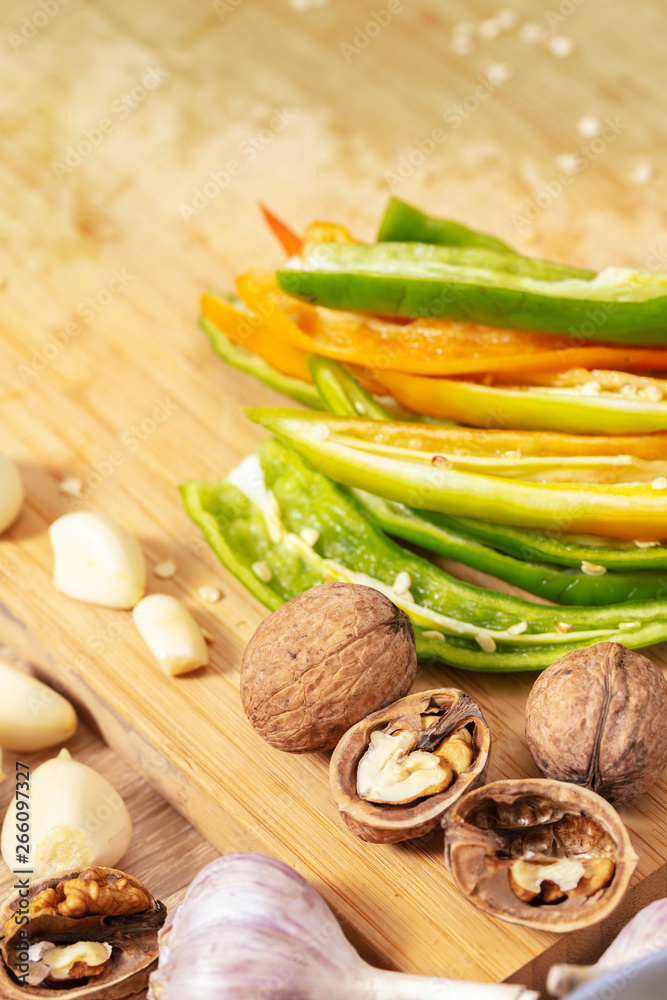 Fototapeta premium green hot pepper with garlic and nuts