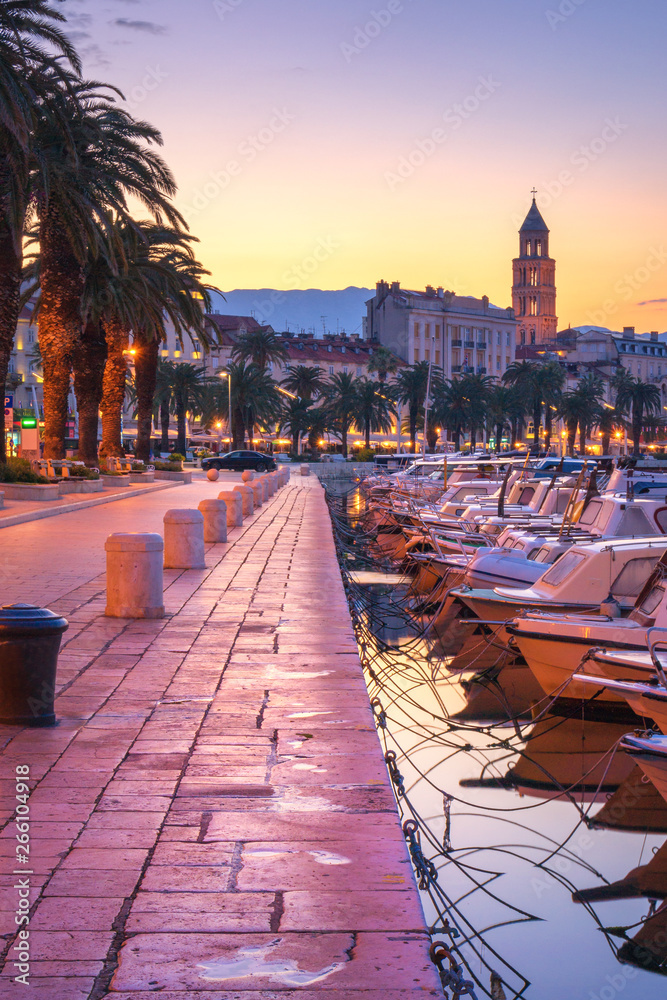 Split during sunrise, fishing boats at the promenade - beautiful Croatia