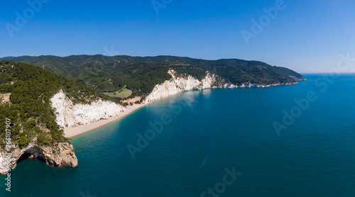 Aerial view of high white cliffs of Vignanotica beach in Apulia region, Italy