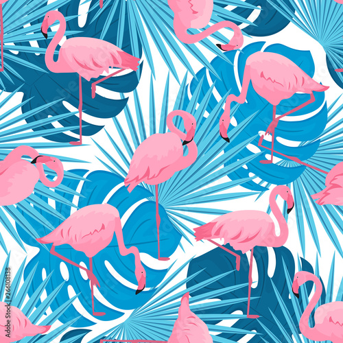 Graceful flamingos and monstera and palm leaves. Tropical summer seamless pattern.