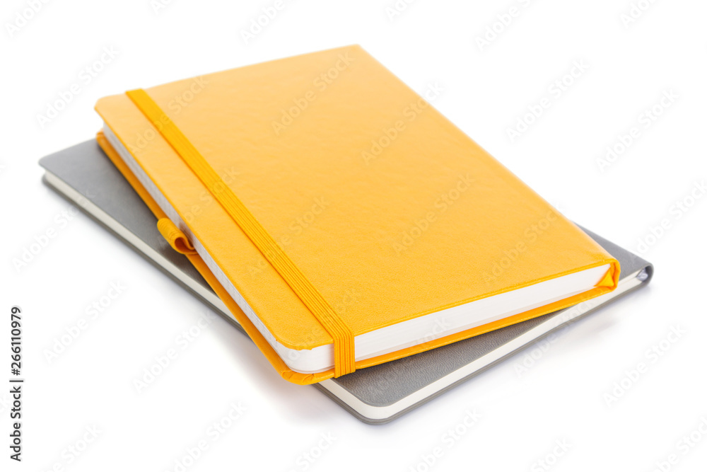 notebook or notepad isolated at white - obrazy, fototapety, plakaty 