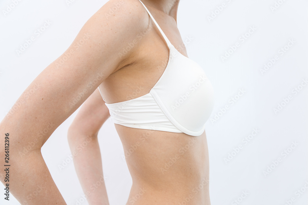 Side View Slim Young Athletic Girl In White Lingerie Shows Her Figure side-view-slim-young-athletic-girl-in-white-lingerie-shows-her-figure