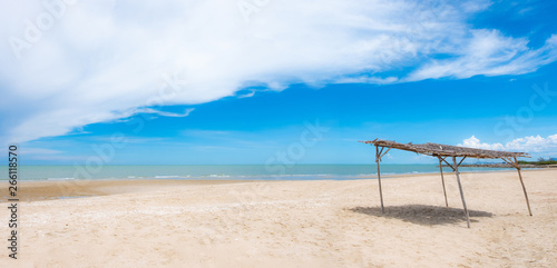 Native beach umbrellas on the beach, beautiful sea and beautiful sky. Used to shade tourists while enjoying relaxation