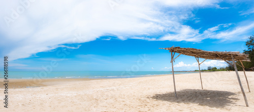 Native beach umbrellas on the beach, beautiful sea and beautiful sky. Used to shade tourists while enjoying relaxation