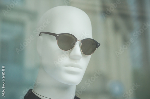 Closeup of sun glasses on mannequin in fashion store swhowroom for men