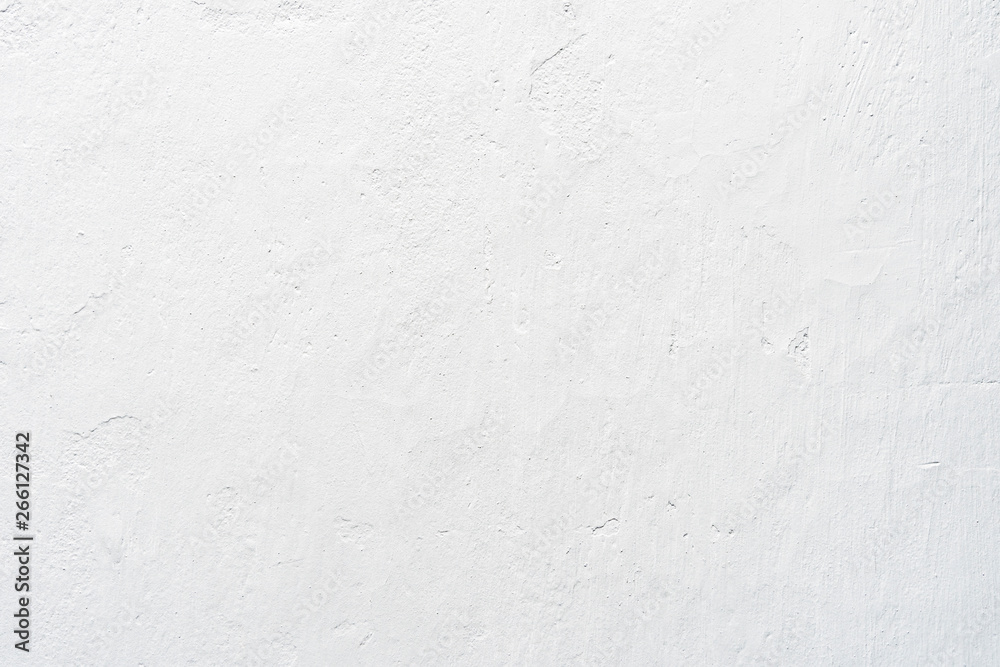 White concrete texture on wall with sunlight for abstract background.