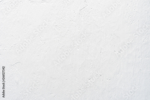 White concrete texture on wall with sunlight for abstract background.