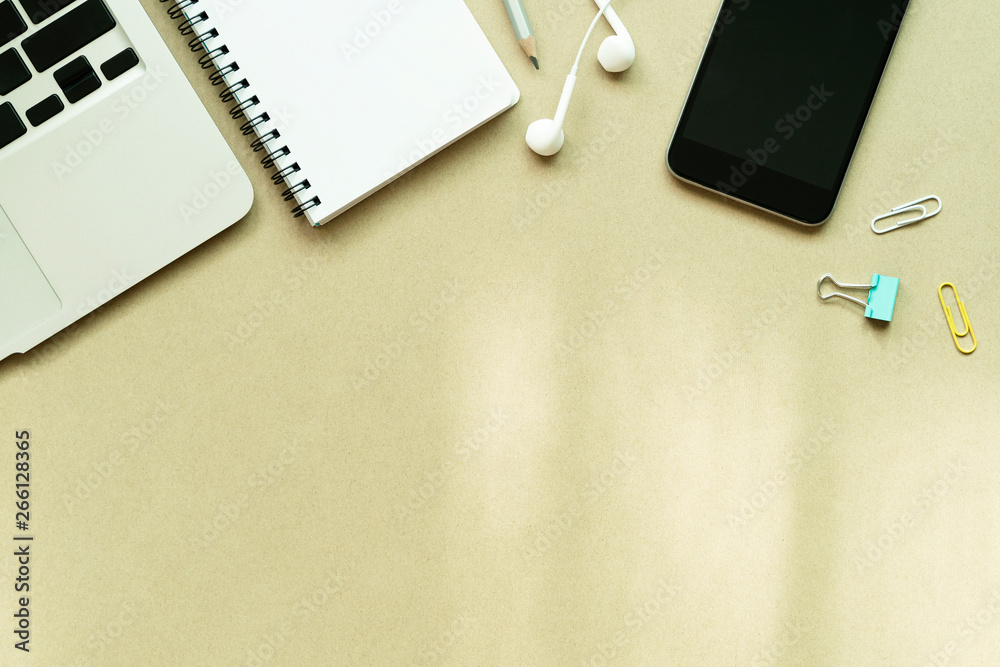 Business and working space background concept. Laptop, notebook, mobile and accessories on table with free space for text. Business and working space background concept. Laptop, notebook, mobile and accessories on table with free space for text.