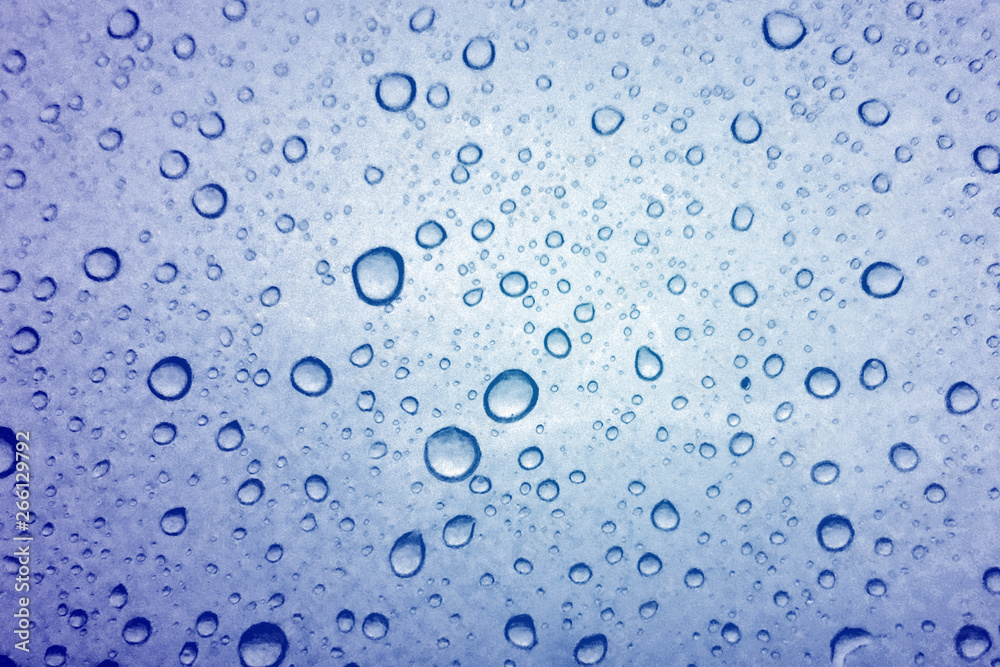 Water droplets texture on blue background Water droplets texture on blue background