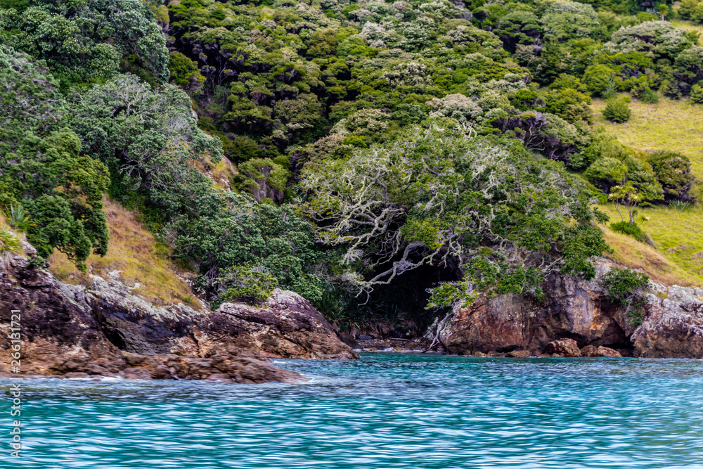 Stormy, skies, blue skies, dotted rock islands are a pleasant view durinf a cruise around the Bay of Islands