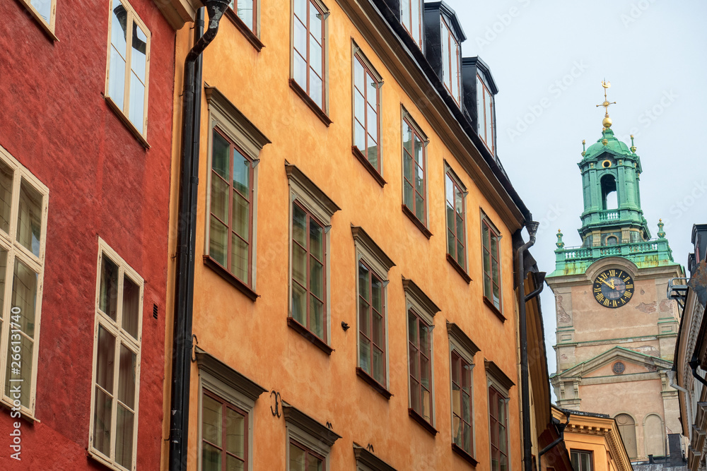 Streets of Stockholm. Colorful houses and the Church of St. Nicholas. Sweden
