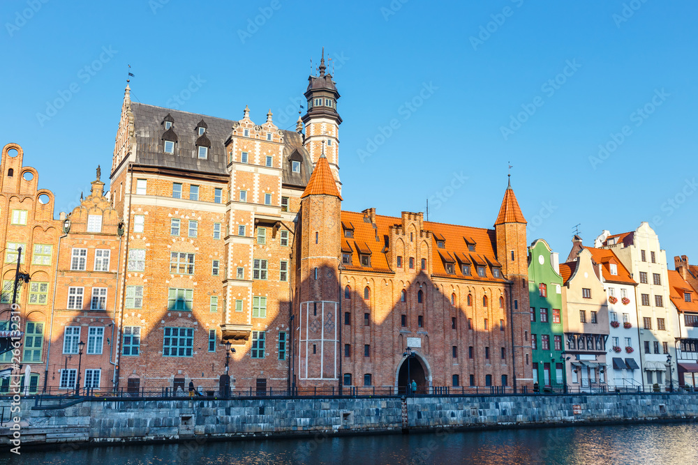 Sunny day at embankment of Motlawa river in historical part of Gdansk, Poland