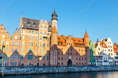 Sunny day at embankment of Motlawa river in historical part of Gdansk, Poland