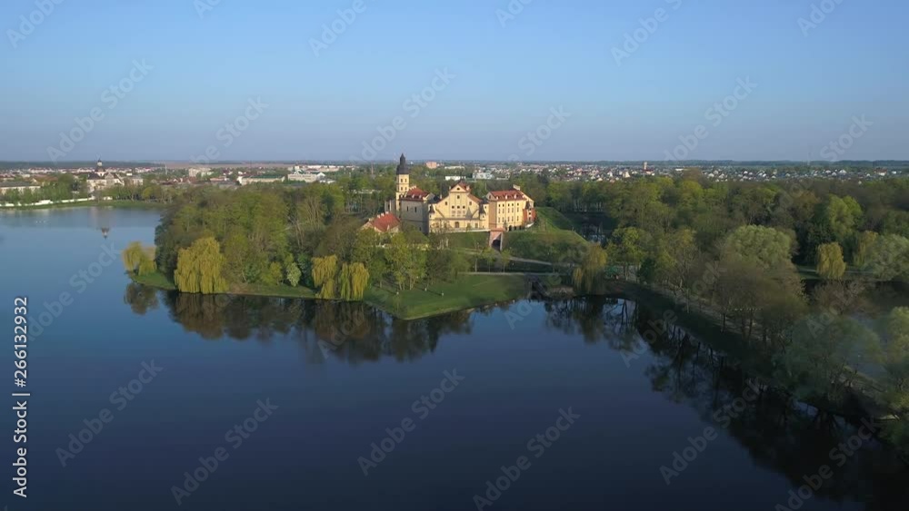 View on the old Nesvizh castle on a Sunny April morning. Nesvizh, Belarus (aerial survey) View on the old Nesvizh castle on a Sunny April morning. Nesvizh, Belarus (aerial survey)