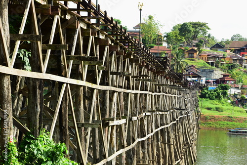 Close-up view, large wooden bridge Long and large at Sangkhla Buri District, Kanchanaburi Province, Thailand photo