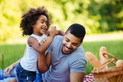 Happy family having fun time on picnic