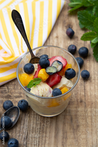 Fruit Salad With Ice Cream Blueberries Strawberries Mango And Mint Summer Refreshing Dessert Wooden Background Glass With Vanilla Icecream Stock Photo Adobe Stock