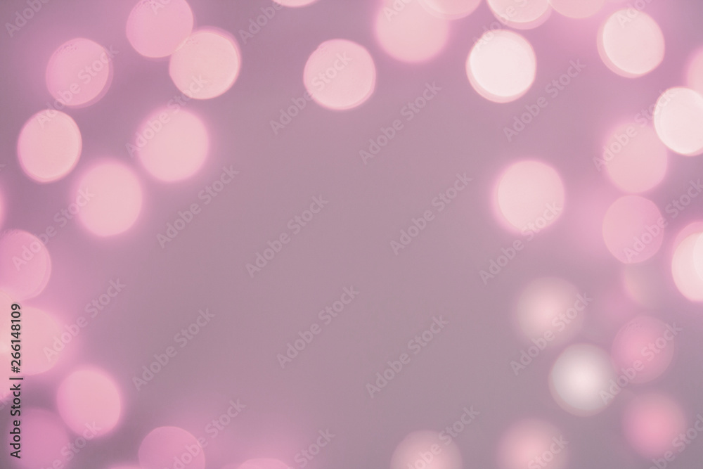 Blurred purple sparkling festive bokeh background