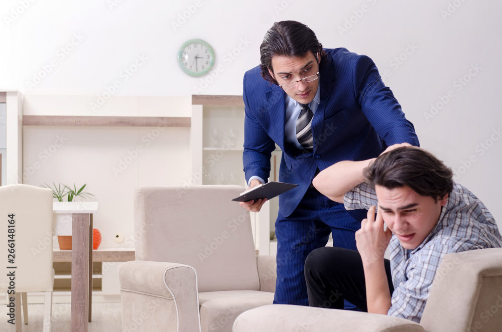 Young male patient discussing with psychologist personal problem Young male patient discussing with psychologist personal problem