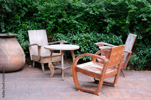 wooden table & chair in garden