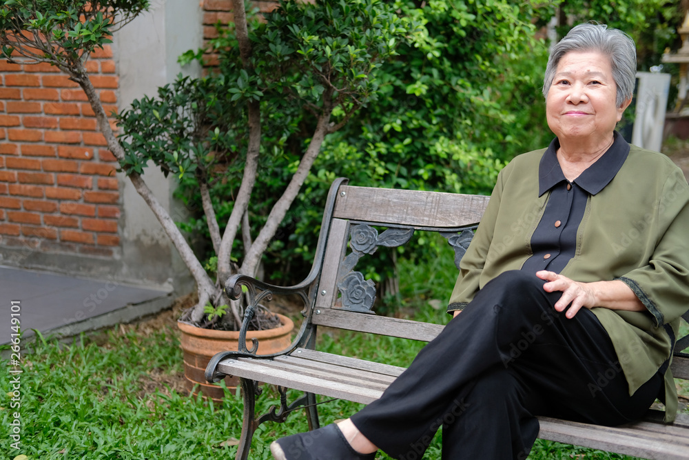 old elder woman resting in park. elderly female relaxing outdoors. senior leisure lifestyle old elder woman resting in park. elderly female relaxing outdoors. senior leisure lifestyle