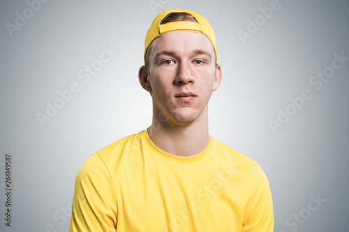 Teenager having serious and calm face.