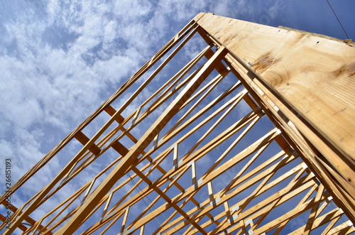 Wood framework of commercial building under construction. © Tom