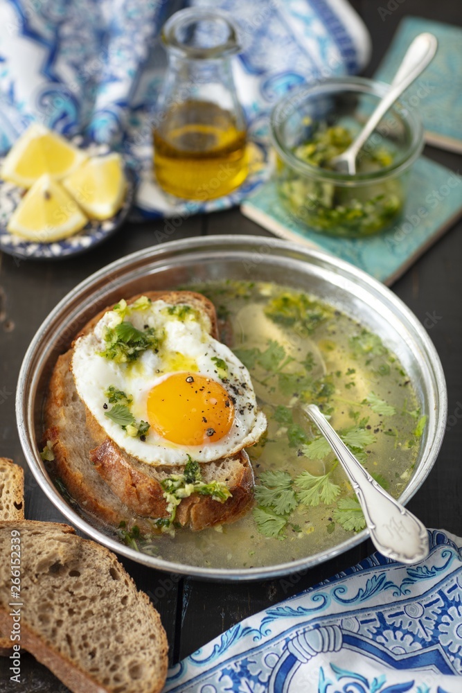 Portugal garlic soup with bread and egg, sopa alentejana