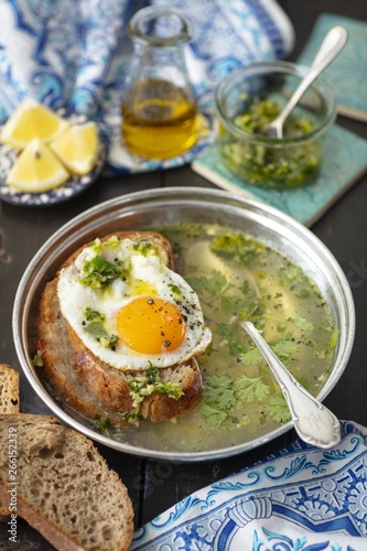 Portugal garlic soup with bread and egg, sopa alentejana