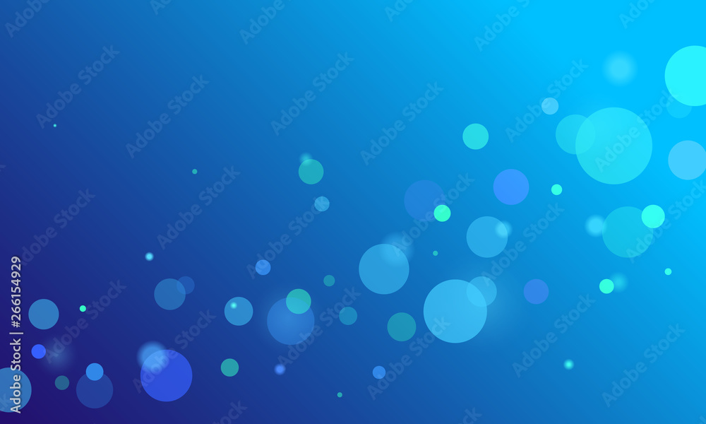 Abstract bokeh on blue gradient background