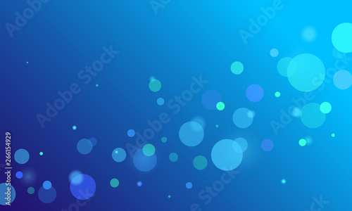 Abstract bokeh on blue gradient background