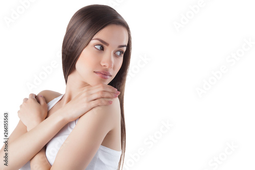 Young attractive woman on isolated white background. Female facial portrait. Closeup portrait of beautiful lady. photo