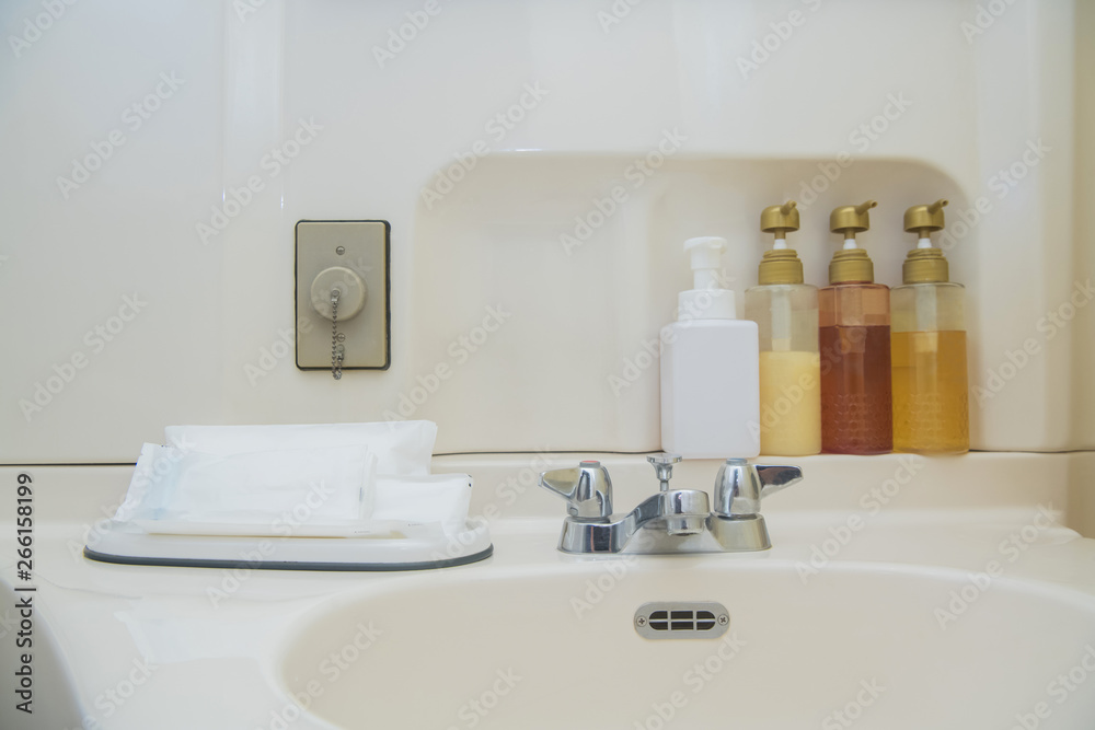 toiletry bag with travel toiletries, small plastic bottles of hygiene products and soap toiletry bag with travel toiletries, small plastic bottles of hygiene products and soap