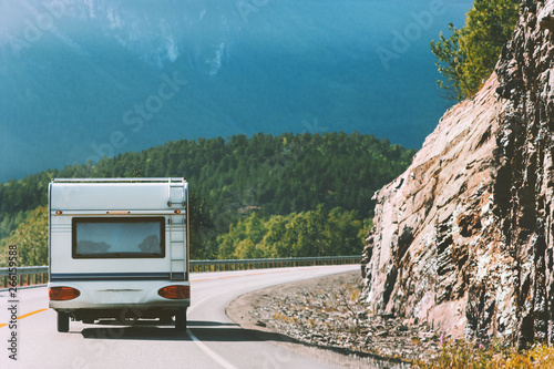 Camper road trip in Norway RV trailer summer vacations traveling family journey Fotobehang
