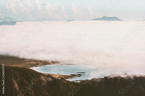 Mountains and clouds over sea landscape Travel aerial view wilderness nature tranquil picturesque scenery