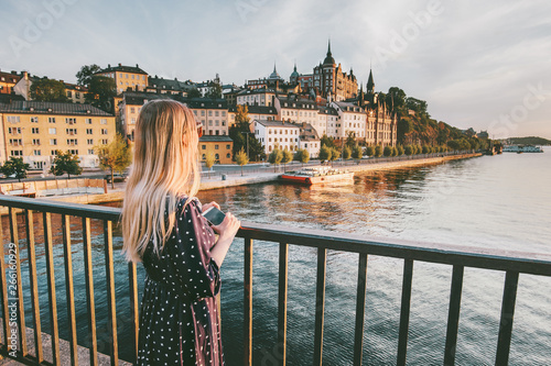 Canvas Print Tourist woman sightseeing Stockholm city enjoying view traveling lifestyle summe