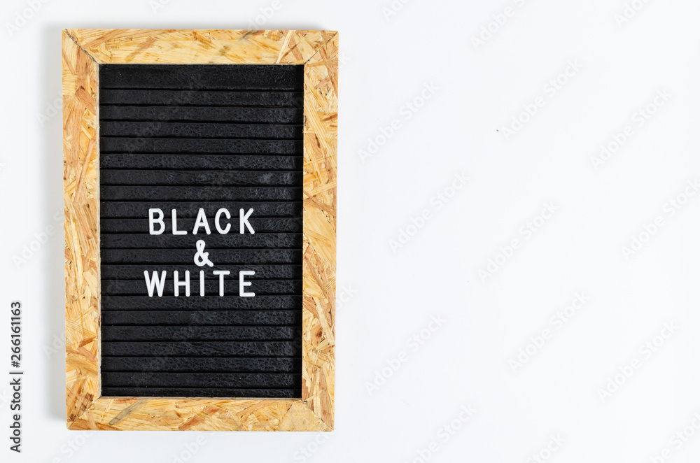 Letter board with white inscription black and white.