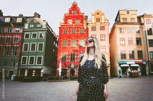 Photography Young woman walking in Stockholm travel sightseeing Gamla Stan architecture life