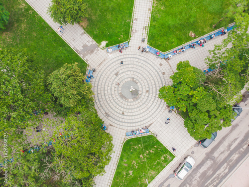 overhead view of city park square with benches