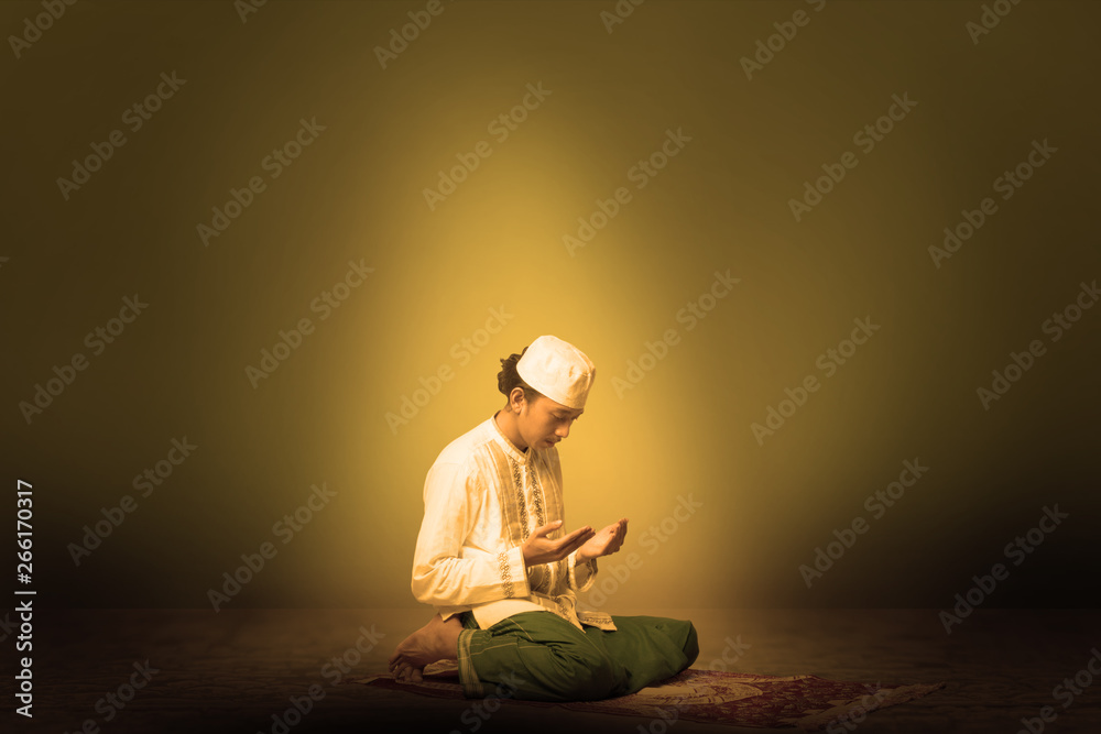 Muslim men with an attitude to call to prayer Muslim men with an attitude to call to prayer