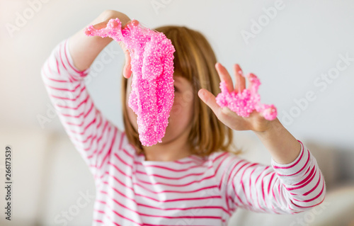 Little girl making homemade slime toy