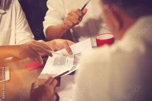 business adviser meeting to analyze and discuss the situation on the financial report in the meeting room.Investment Consultant,Financial Consultant,Financial advisor and accounting concept. photo