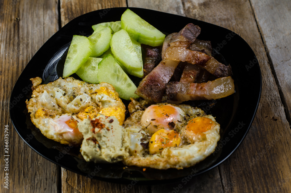 Fototapeta premium quail eggs with a cucumber salad