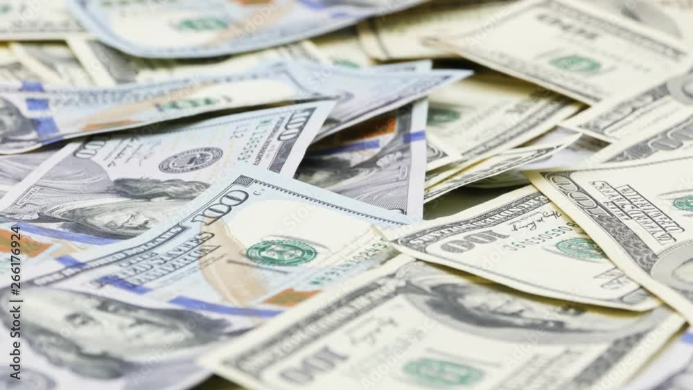 One hundred US banknotes. Cash. hundred dollar, 100 dollar One hundred US banknotes. Cash. hundred dollar, 100 dollar