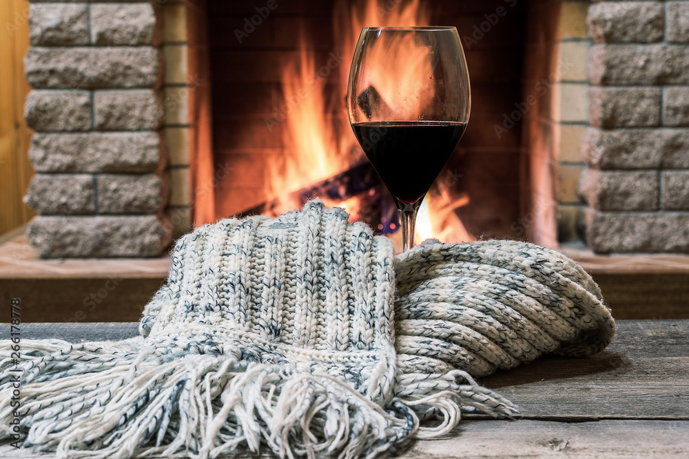 A Glass Of Wine In Front Of A Fireplace Fleece Blanket by Flavio
